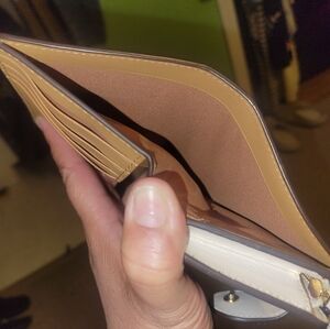 Coach Corner zip medium wallet. Matching makeup bag in my closet